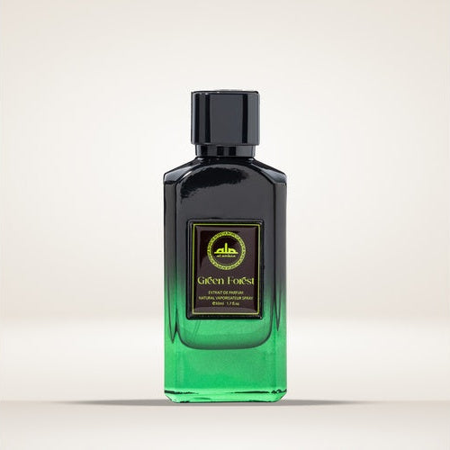 A rectangular perfume bottle for Al Ambra Green Forest, fading from glossy black to vibrant emerald green, with a black and gold label